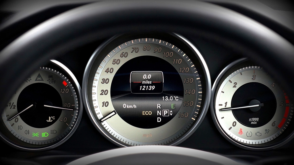 Close-up of a car instrument cluster used for vehicle diagnostics