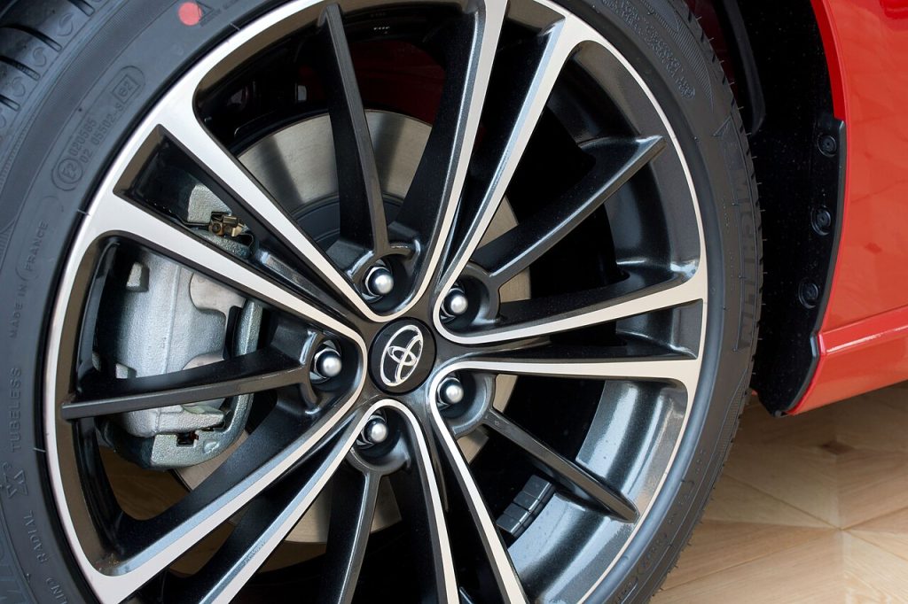 Front wheel and disc brake of a car, ready for a wheel alignment check
